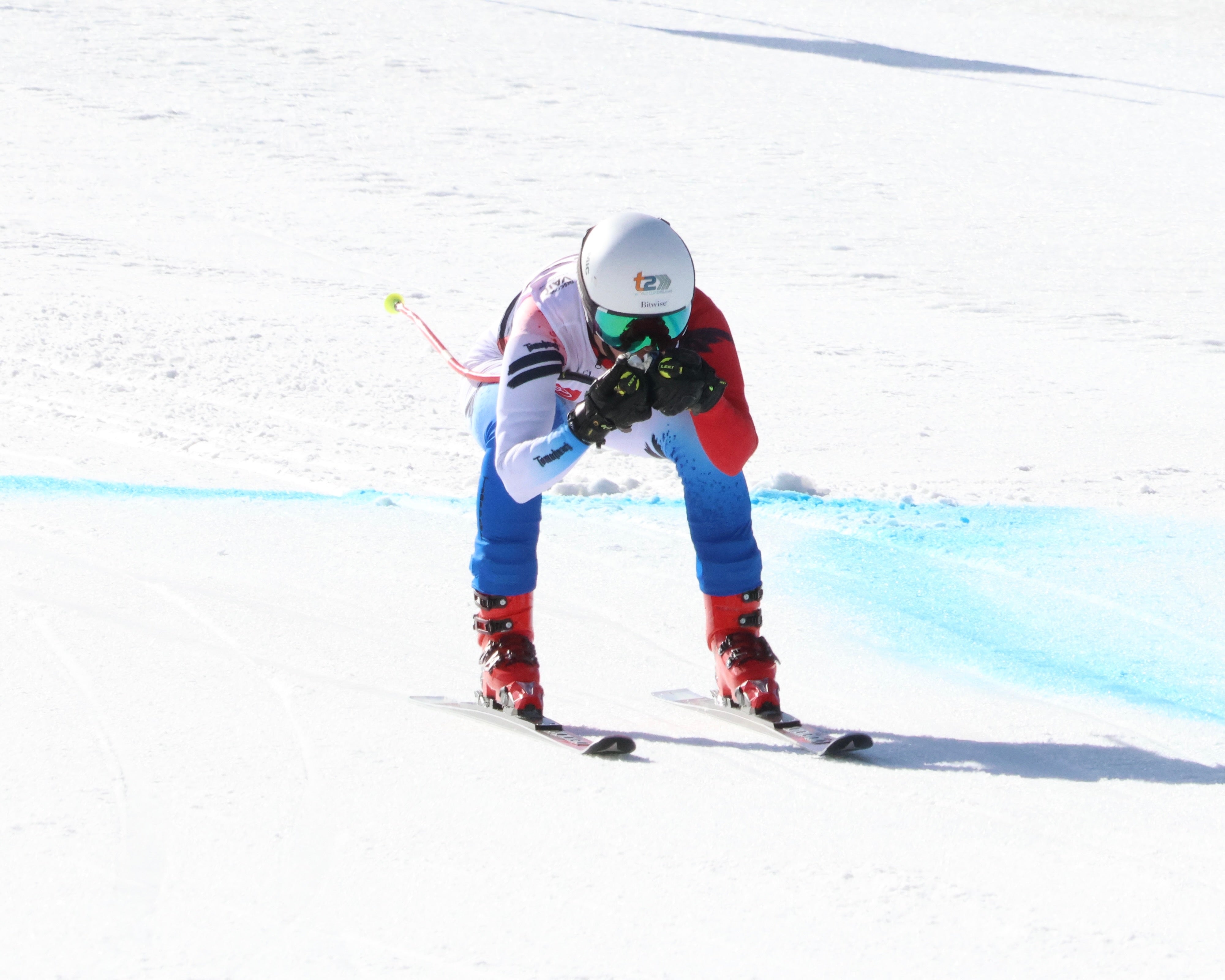 Ski racing in a Tomahawk suit